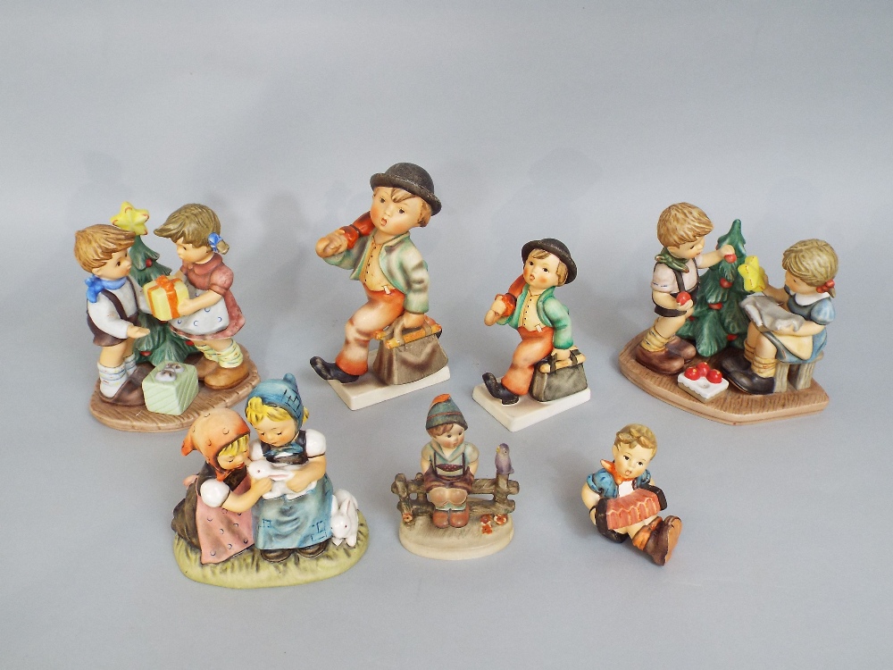 A collection of Goebel figures and groups including Decorating the Tree BH75, A Present For You - Image 2 of 3