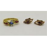 Stylised gem set jewellery comprising a ruby, sapphire and diamond ring in unmarked yellow metal,