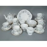 A collection of Colclough Rhapsody in Blue teawares including cake plate, teapot, two milk jugs,