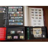 A mostly mint collection of Channel Islands & Isle of Man stamps and Presentation packs in six