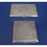 Two engine turned silver cigarette cases, 9oz approx (2)