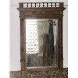 Three similar late 19th century French wall mirrors of varying size all with carved detail and