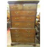 A Georgian oak chest on chest, fitted with six long and two short drawers, the upper section with