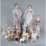 A pair of large late 19th century continental figures of male and female characters, 60cm tall