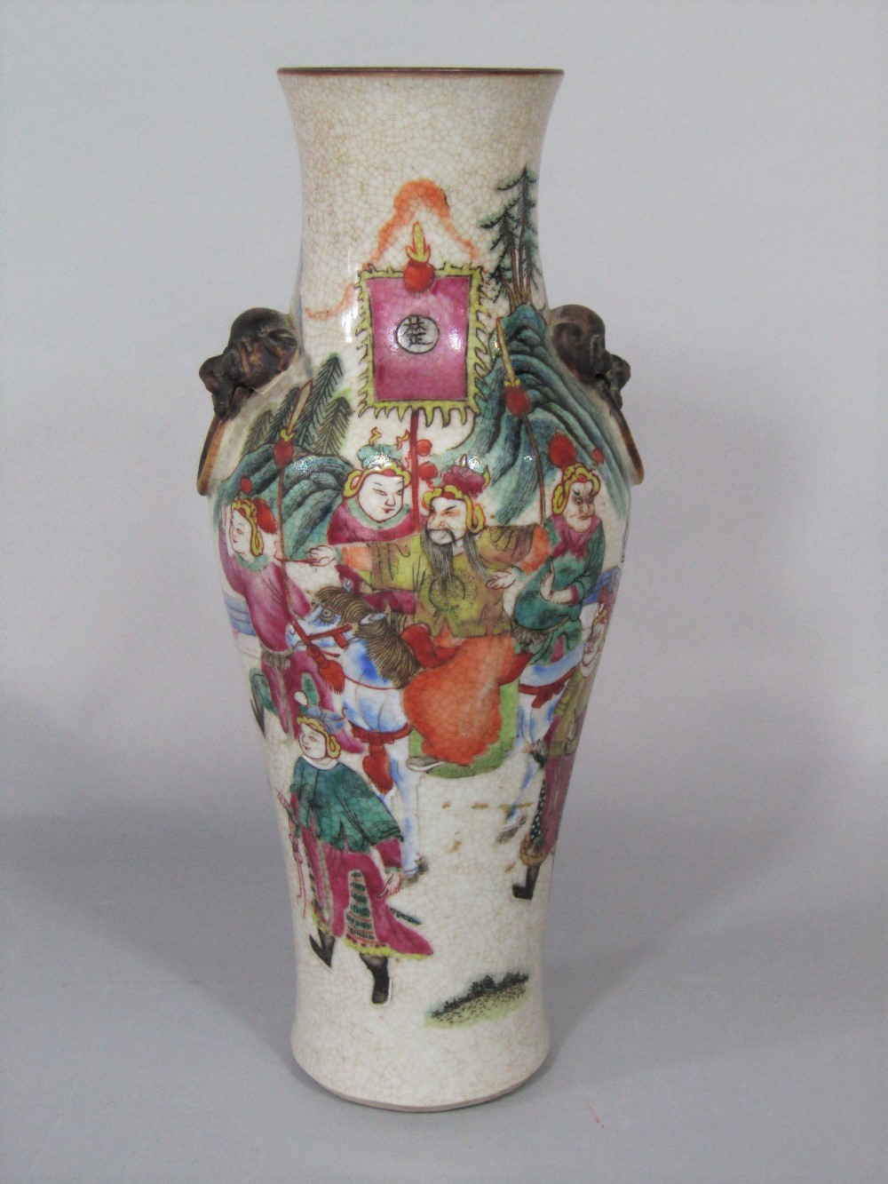 A Satsuma type table lamp base with polychrome painted male warrior decoration, with moulded