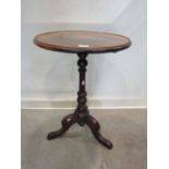 A Victorian mahogany tray top occasional table of circular form with inlaid detail raised on a