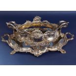 Good continental silver plated table centre piece in the Rococo manner with mirrored twin handled