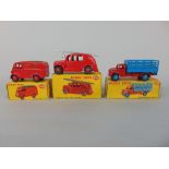 Three Dinky Toys including Streamlined Fire Engine 250, Royal Mail Van 260 and Farm Produce Wagon