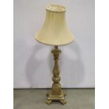 A carved gilt wood table lamp in the form of a pricket candlestick with vase shaped stem, acanthus