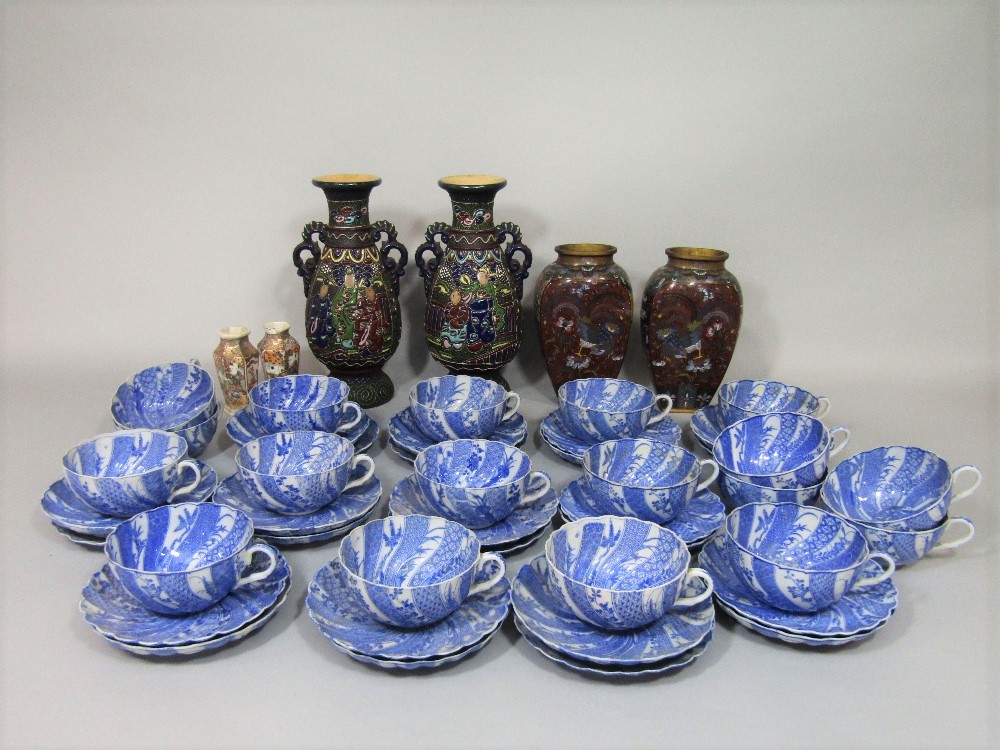 A collection of oriental ceramics comprising blue and white eggshell porcelain teawares of wrythen