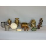 A box containing a collection of eastern metalware to include a bronze and gilt metal figure f a