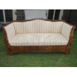 A 19th century Biedermeier sofa with walnut showwood frame and upholstered panels, 2m long