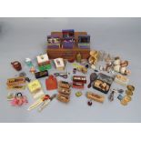 Cigar box containing a mixed collection of small items, dolls house effects, etc