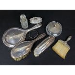 Collection of silver dressing set items comprising three brushes, a hand mirror, a silver lidded cut