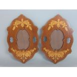 A pair of good quality box wood inlaid mahogany hanging frames of oval form, 34cm high (2)