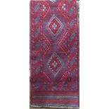 Kelim runner with blue ground and red relief decoration, 260 x 65cm