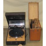 A vintage cased portable Decca 30 windup gramophone together with a small wooden case containing