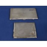 Two engine turned silver cigarette cases, 10.5oz approx (2)