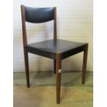 A Danish teak framed single chair, with black rexine upholstered seat and back rail, together with