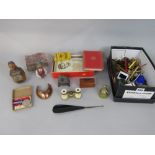 A box of interesting items to include various stationery, medals, treen ware and others