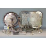 A box containing a collection of silver plate to include a gallery tray, salver, pair of