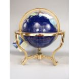 'The Worlds finest Gemstone Globe', upon a brass stand