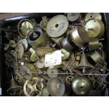 A box of various brass movements and cogs to include fusee and other movement