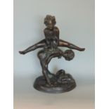 Cast bronze character group of two boys playing leap frog, 25cm high