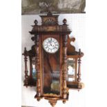 Vienna regulator wall clock, the architectural case flanked by twin bevelled mirrors and shelves,