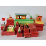 Collection of boxed O gauge model railway rolling stock, track and platform buildings and