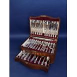 Viners of Sheffield two tier canteen of cutlery within a serpentine mahogany canteen