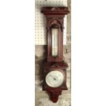 Edwardian walnut barometer thermometer, with silvered back plate and architectural case, 67 cm high