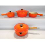 Collection of le Crueset burnt orange cookware; together with one other (4)