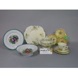 A collection of Crown Staffordshire teawares with yellow poppy detail comprising teapot, milk jug,
