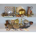 A large collection of miscellaneous items to include mainly metalware comprising brass candlesticks,