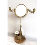 Interesting gentleman's dressing mirror, the hinged mirror flanked by two candle sconces upon a