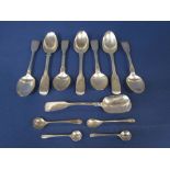 A mixed collection of spoons to include seven various silver teaspoons to include a Georgian