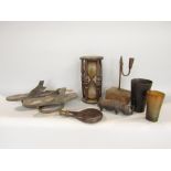 A box of interesting items to include a rush light and cutter, gun powder flask, egg timer, carved