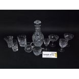 A collection of various cut glassware to include champagnes, wines, tumblers, etc, together with a