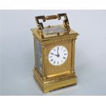 Impressive gilt brass Grand Sonnerie carriage clock, with five minute and hour repeat buttons,