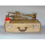 Cased gold plated Boosey and Hawkes gold plated trumpet with muting device
