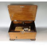 Early 20th century walnut cased box polyphone with label 'Keith Harding Antiques musical box