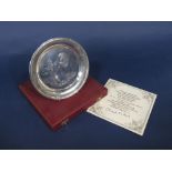 A cased silver presentation plate engraved with Britannia and Queen Victoria, with certificate