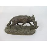 Cast bronze character group of a fox carrying a bird in its mouth set on a naturalistic base,
