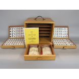 Complete cased Mahjong set, the case with open dovetail joints enclosing five long graduated drawers