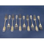 Set of four late Victorian silver fiddle pattern table forks, London 1899, 9.5oz approx, together