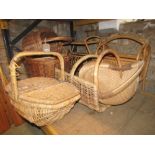 A small collection of wicker baskets of varying design and two magazine racks (8)