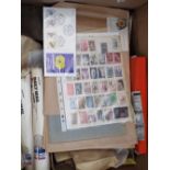 Three boxes containing a very large quantity of stamps, albums, etc