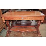 A Victorian mahogany side table/washstand of rectangular form with moulded outline over a central