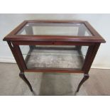 An inlaid Edwardian mahogany floorstanding vitrine/bijouterie table of rectangular form with